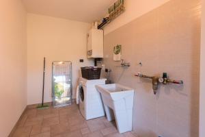 Η κουζίνα ή μικρή κουζίνα στο Albergo Diffuso Forgaria Monte Prat