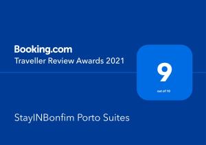 StayINBonfim Porto Suitesに飾ってある許可証、賞状、看板またはその他の書類