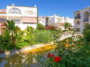 Vonkajšia záhrada v ubytovaní Apartments Kione Playa Romana Park