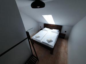 Postel nebo postele na pokoji v ubytování Nad Hřištěm 441