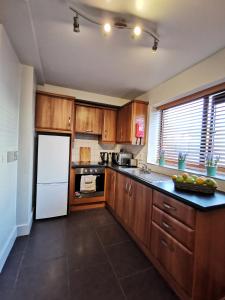A cozinha ou cozinha compacta de Milligan Court Apartments