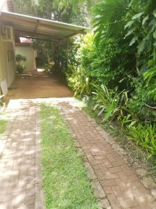 a brick walkway in front of a house at A-Cody Place in Louis Trichardt