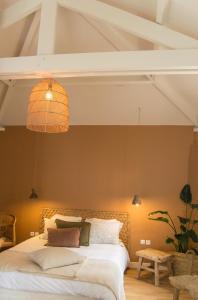 Ein Bett oder Betten in einem Zimmer der Unterkunft Villa Louisa