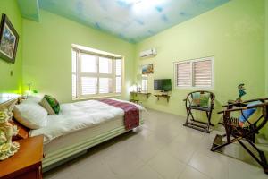 TV a/nebo společenská místnost v ubytování Yi Jing B&B