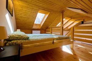 Posteľ alebo postele v izbe v ubytovaní Winiec Family Houses + 37 fotografií