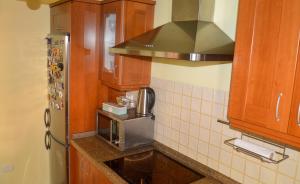 Kuchyň nebo kuchyňský kout v ubytování Apartamento en Casco Histórico