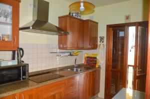 Kuchyň nebo kuchyňský kout v ubytování Apartamento en Casco Histórico
