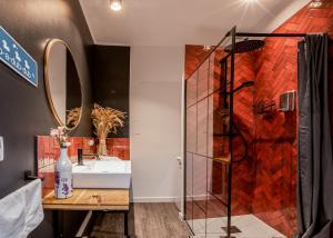 a bathroom with a sink and a shower at E&A Royal Luxury Apartments, Bydgoszcz - SKYLINE in Bydgoszcz