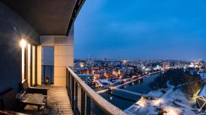 Balkón alebo terasa v ubytovaní E&A Royal Luxury Apartments, Bydgoszcz - SKYLINE