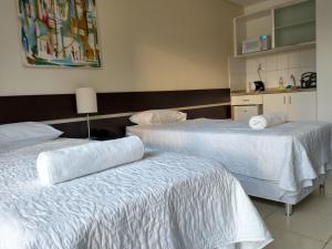 Łóżko lub łóżka w pokoju w obiekcie Flat Athenas 611