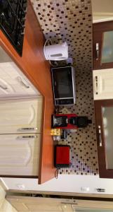 a view from above of a kitchen with a counter top at Grande Villa de Prestige près de Paris Réunions Familiales, Professionnelles et Événements in Gien +9 photos
