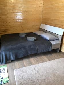 Postel nebo postele na pokoji v ubytování Roua Muntelui