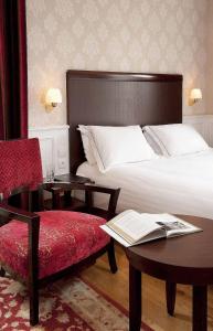 Postel nebo postele na pokoji v ubytování Best Western Plus Hôtel D'Angleterre