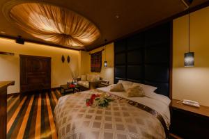 Postel nebo postele na pokoji v ubytování HOTEL MYTH-S -ホテル マイス エス- adult only