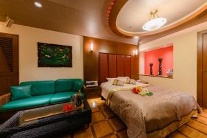 Postel nebo postele na pokoji v ubytování HOTEL MYTH-S -ホテル マイス エス- adult only