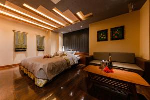 Postel nebo postele na pokoji v ubytování HOTEL MYTH-S -ホテル マイス エス- adult only