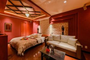 Postel nebo postele na pokoji v ubytování HOTEL MYTH-S -ホテル マイス エス- adult only