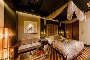 Postel nebo postele na pokoji v ubytování HOTEL MYTH-S -ホテル マイス エス- adult only