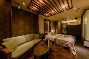 Postel nebo postele na pokoji v ubytování HOTEL MYTH-S -ホテル マイス エス- adult only