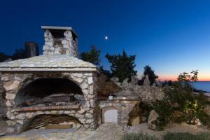 Gallery image of Villa, Stone House with swimming pool & Sauna, Beach, Sevid in Sevid +56 photos