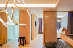 Area soggiorno di FX Hotel Tainan