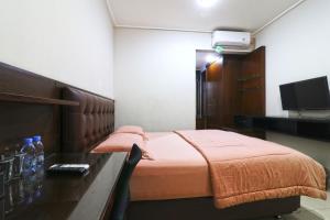 TV a/nebo společenská místnost v ubytování Bendungan Hilir Residence