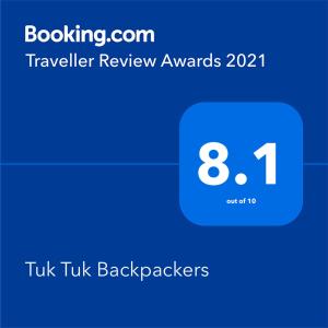 uno screenshot di un'app di taxi con il trucco del testo imballaggi di Tuk Tuk Backpackers Jaipur a Jaipur