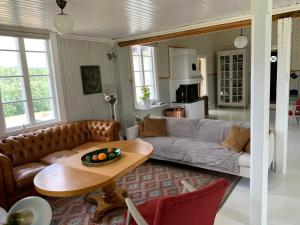 Ruang duduk di Rustic luxury lakeside house transformed chapel