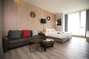 Voodi või voodid majutusasutuse Hotel Day Plus Teascape toas