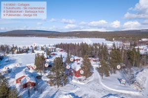 an aerial view of a ski resort in the snow at Ylläksen Yöpuu in Äkäslompolo