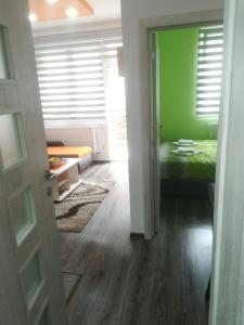 Ліжко або ліжка в номері Apartman HEDONIJA