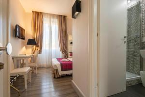 Posteľ alebo postele v izbe v ubytovaní Suite Castrense