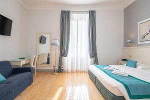 Posteľ alebo postele v izbe v ubytovaní Suite Castrense
