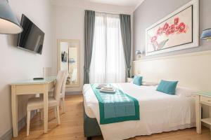Posteľ alebo postele v izbe v ubytovaní Suite Castrense
