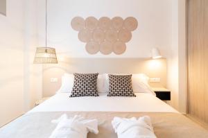Postel nebo postele na pokoji v ubytování Calafell Home Apartments