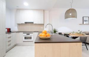Kuchyň nebo kuchyňský kout v ubytování Calafell Home Apartments