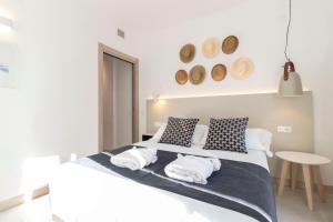 Postel nebo postele na pokoji v ubytování Calafell Home Apartments