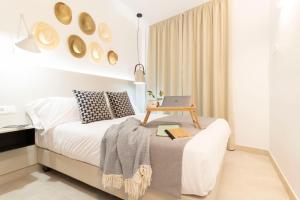Postel nebo postele na pokoji v ubytování Calafell Home Apartments + 37 fotografií