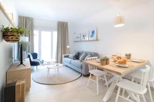 Posezení v ubytování Calafell Home Apartments