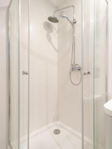 Kúpeľňa v ubytovaní ApartmentyPrzyMorzu Ogrody