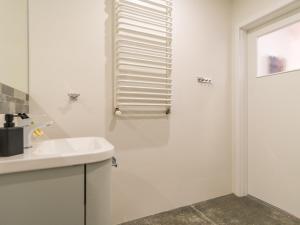 Kúpeľňa v ubytovaní ApartmentyPrzyMorzu Ogrody
