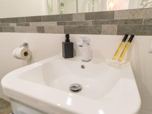 Kúpeľňa v ubytovaní ApartmentyPrzyMorzu Ogrody