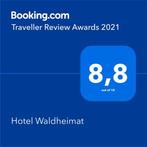Un certificat, premiu, logo sau alt document afișat la Hotel Waldheimat