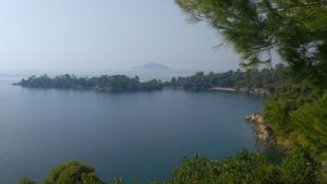 an island in the middle of a large body of water at Haus Despina in Sarti