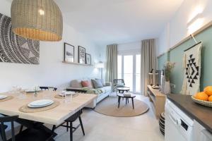 Kuchyň nebo kuchyňský kout v ubytování Calafell Home Apartments