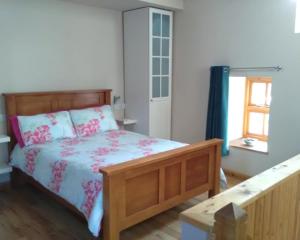 Postel nebo postele na pokoji v ubytování Cardigan Coastal Cottages