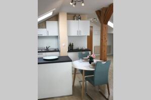 Dapur atau dapur kecil di Smartes DG Apartment-DREAM and RELAX