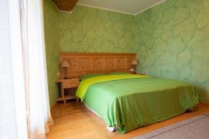 Кровать или кровати в номере Isarco Suite