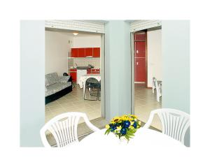 Postel nebo postele na pokoji v ubytování Flat in Lignano