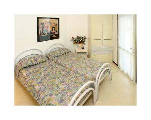 Postel nebo postele na pokoji v ubytování Flat in Lignano